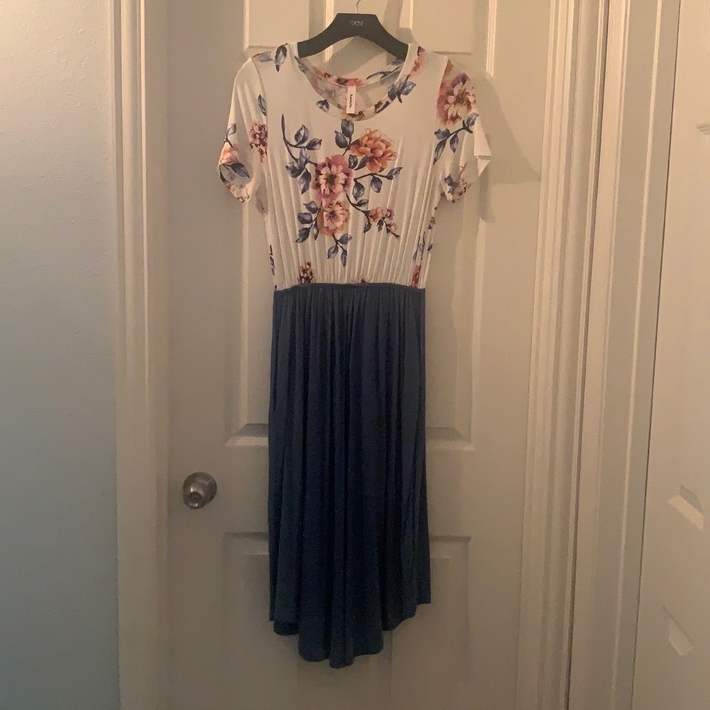 Mid length super soft stretch floral and solid dress.